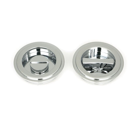 This is an image showing From The Anvil - Polished Chrome 60mm Art Deco Round Pull - Privacy Set available from trade door handles, quick delivery and discounted prices