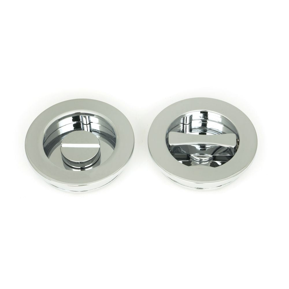 This is an image showing From The Anvil - Polished Chrome 60mm Plain Round Pull - Privacy Set available from trade door handles, quick delivery and discounted prices