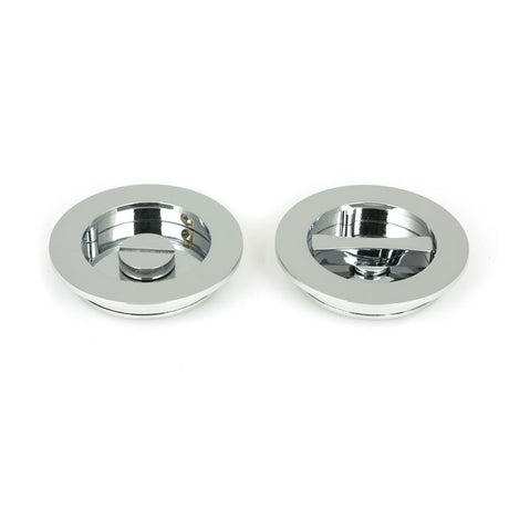 This is an image showing From The Anvil - Polished Chrome 75mm Plain Round Pull - Privacy Set available from trade door handles, quick delivery and discounted prices