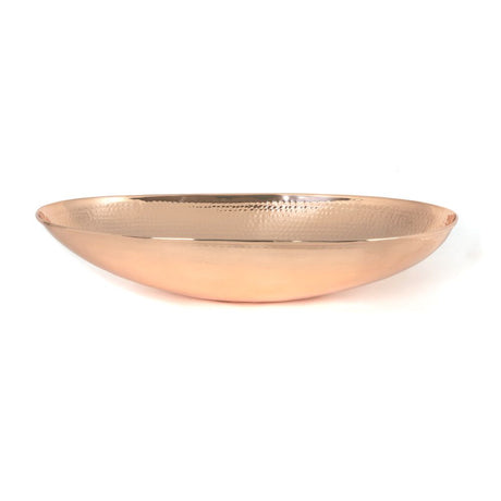 This is an image showing From The Anvil - Hammered Copper Oval Sink available from trade door handles, quick delivery and discounted prices