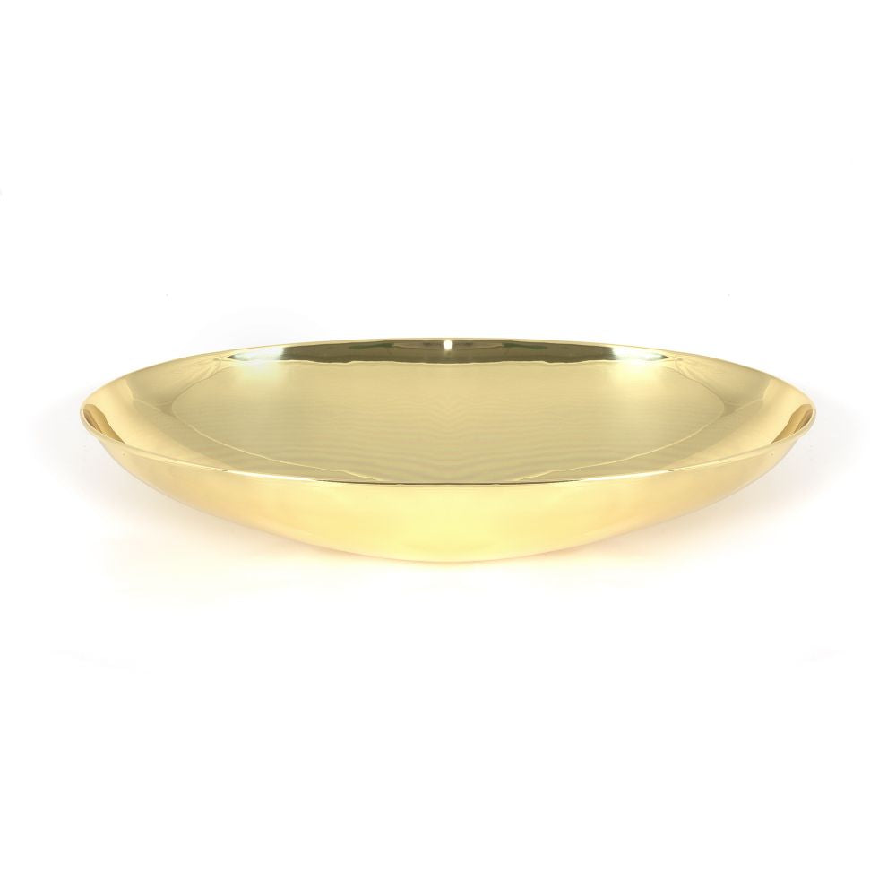 This is an image showing From The Anvil - Smooth Brass Oval Sink available from trade door handles, quick delivery and discounted prices