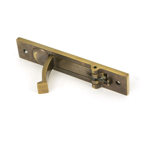 This is an image showing From The Anvil - Aged Brass 125mm x 25mm Edge Pull available from trade door handles, quick delivery and discounted prices