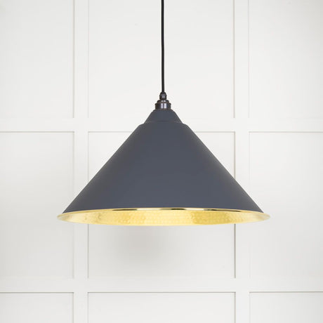 This is an image showing From The Anvil - Hammered Brass Hockley Pendant in Slate available from trade door handles, quick delivery and discounted prices