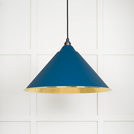 This is an image showing From The Anvil - Hammered Brass Hockley Pendant in Upstream available from trade door handles, quick delivery and discounted prices