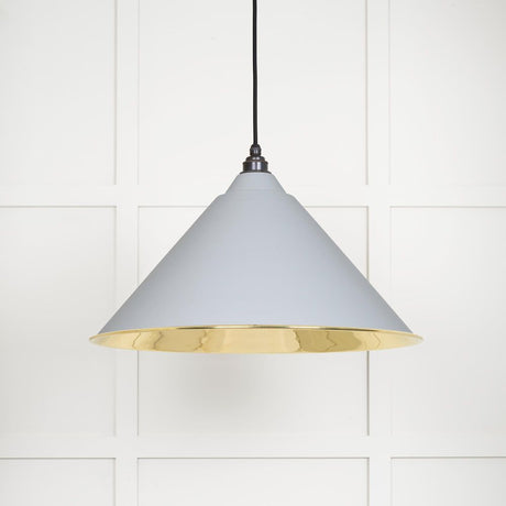 This is an image showing From The Anvil - Smooth Brass Hockley Pendant in Birch available from trade door handles, quick delivery and discounted prices