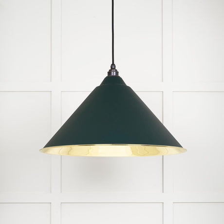 This is an image showing From The Anvil - Smooth Brass Hockley Pendant in Dingle available from trade door handles, quick delivery and discounted prices