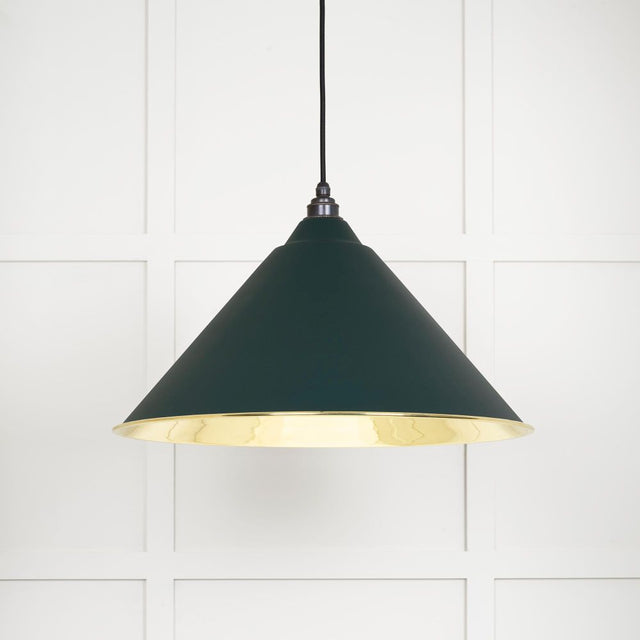 This is an image showing From The Anvil - Smooth Brass Hockley Pendant in Dingle available from trade door handles, quick delivery and discounted prices