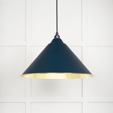 This is an image showing From The Anvil - Smooth Brass Hockley Pendant in Dusk available from trade door handles, quick delivery and discounted prices