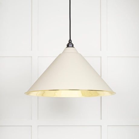 This is an image showing From The Anvil - Smooth Brass Hockley Pendant in Teasel available from trade door handles, quick delivery and discounted prices