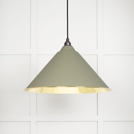 This is an image showing From The Anvil - Smooth Brass Hockley Pendant in Tump available from trade door handles, quick delivery and discounted prices