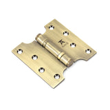 This is an image showing From The Anvil - Aged Brass 4" x 2" x 4"  Parliament Hinge (pair) ss available from trade door handles, quick delivery and discounted prices