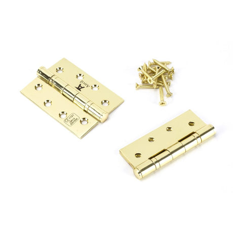 This is an image showing From The Anvil - Polished Brass 4" Ball Bearing Butt Hinge (pair) ss available from trade door handles, quick delivery and discounted prices