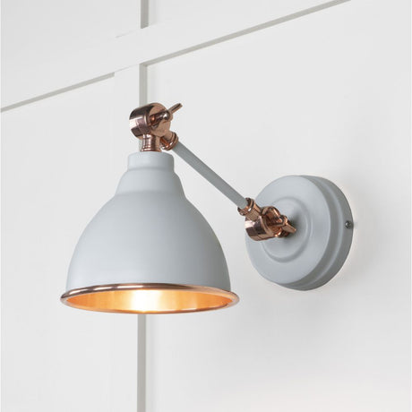 This is an image showing From The Anvil - Smooth Copper Brindley Wall Light in Birch available from trade door handles, quick delivery and discounted prices
