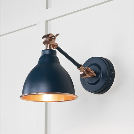 This is an image showing From The Anvil - Smooth Copper Brindley Wall Light in Dusk available from trade door handles, quick delivery and discounted prices