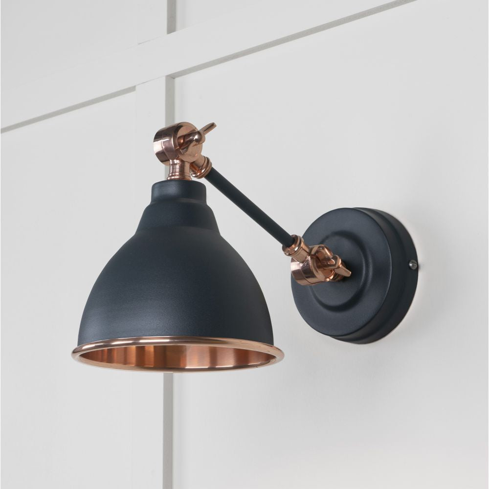 This is an image showing From The Anvil - Smooth Copper Brindley Wall Light in Soot available from trade door handles, quick delivery and discounted prices