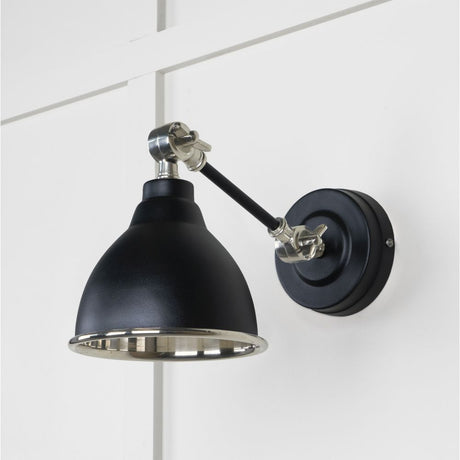 This is an image showing From The Anvil - Smooth Nickel Brindley Wall Light in Elan Black available from trade door handles, quick delivery and discounted prices