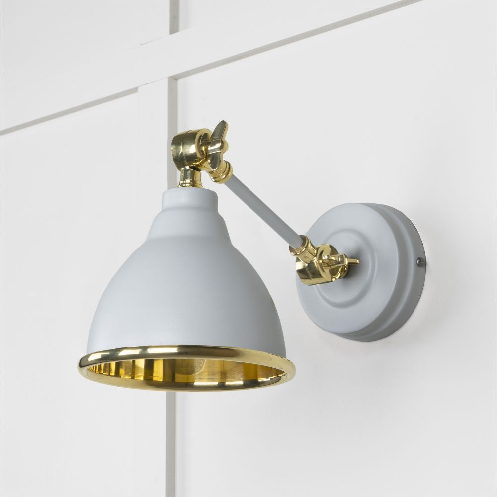 This is an image showing From The Anvil - Smooth Brass Brindley Wall Light in Birch available from trade door handles, quick delivery and discounted prices