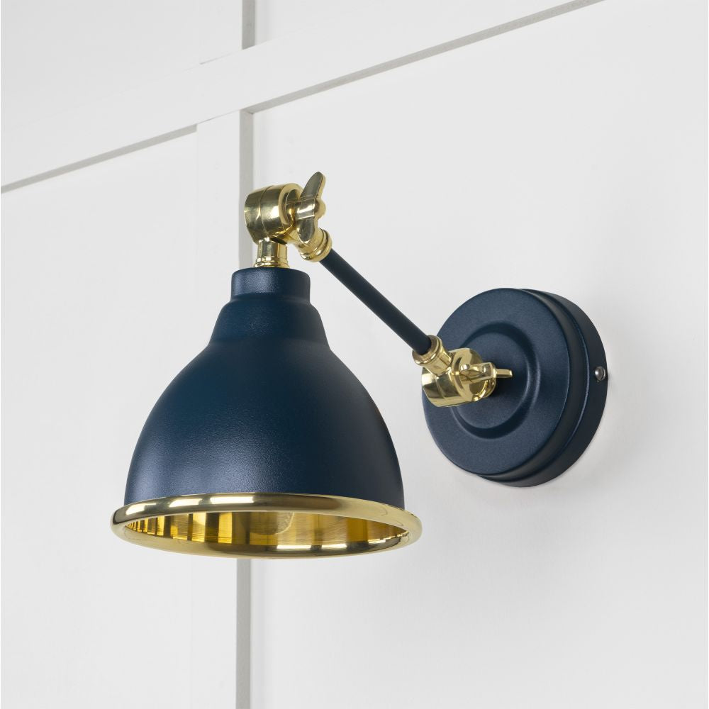 This is an image showing From The Anvil - Smooth Brass Brindley Wall Light in Dusk available from trade door handles, quick delivery and discounted prices