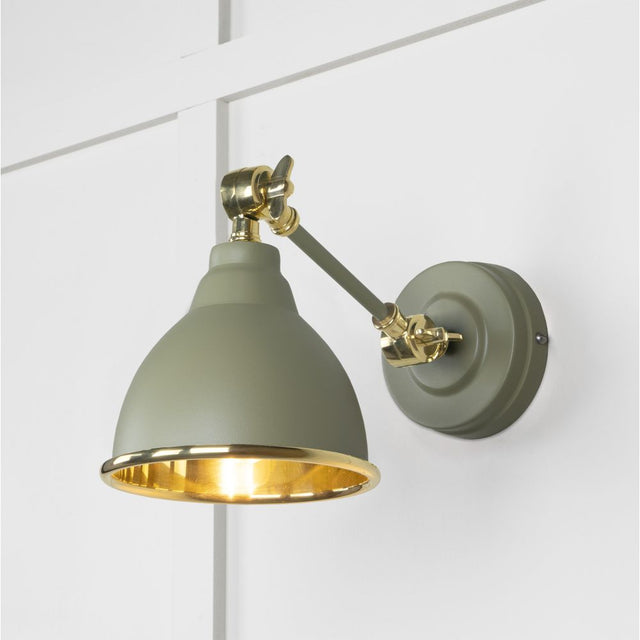 This is an image showing From The Anvil - Smooth Brass Brindley Wall Light in Tump available from trade door handles, quick delivery and discounted prices