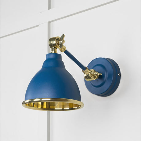 This is an image showing From The Anvil - Smooth Brass Brindley Wall Light in Upstream available from trade door handles, quick delivery and discounted prices