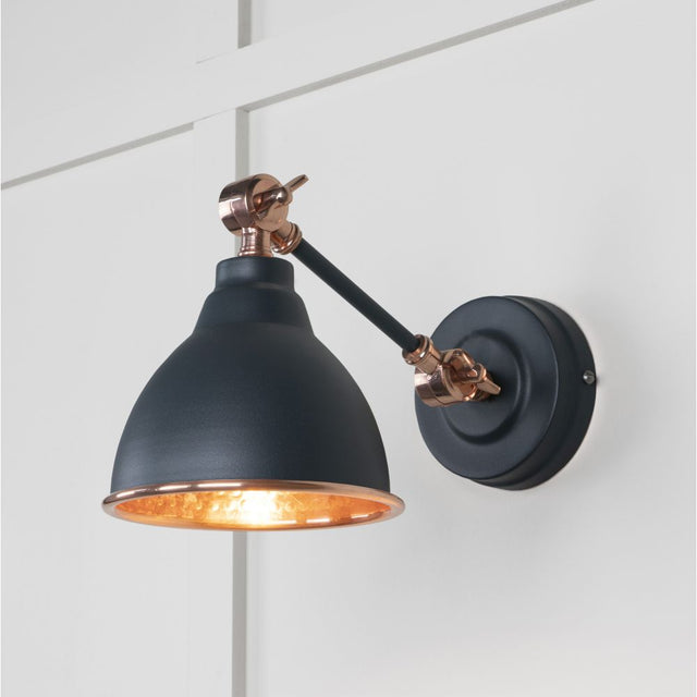 This is an image showing From The Anvil - Hammered Copper Brindley Wall Light in Soot available from trade door handles, quick delivery and discounted prices