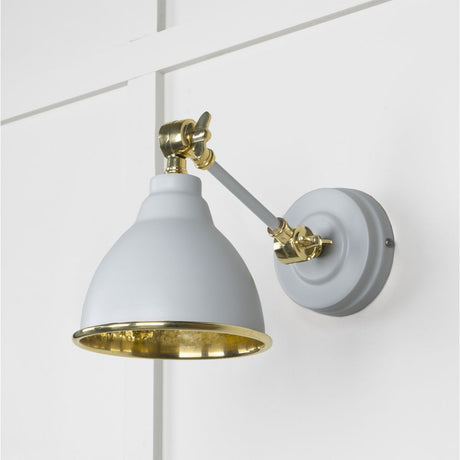 This is an image showing From The Anvil - Hammered Brass Brindley Wall Light in Birch available from trade door handles, quick delivery and discounted prices