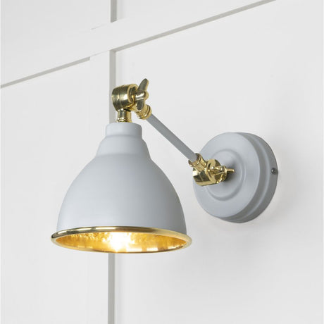 This is an image showing From The Anvil - Hammered Brass Brindley Wall Light in Birch available from trade door handles, quick delivery and discounted prices