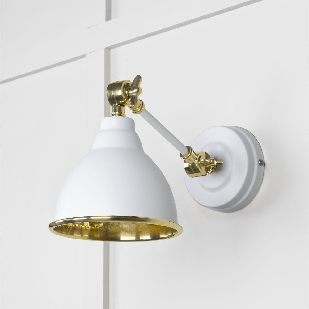 This is an image showing From The Anvil - Hammered Brass Brindley Wall Light in Flock available from trade door handles, quick delivery and discounted prices