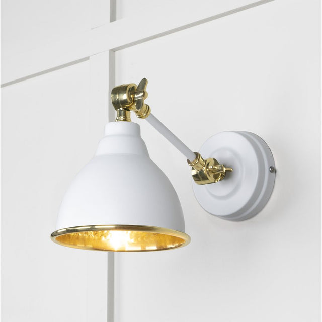 This is an image showing From The Anvil - Hammered Brass Brindley Wall Light in Flock available from trade door handles, quick delivery and discounted prices