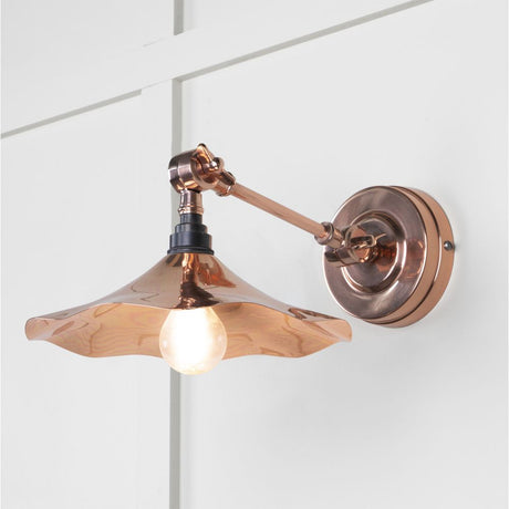 This is an image showing From The Anvil - Smooth Copper Flora Wall Light available from trade door handles, quick delivery and discounted prices