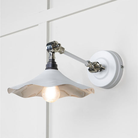This is an image showing From The Anvil - Smooth Nickel Flora Wall Light in Flock available from trade door handles, quick delivery and discounted prices