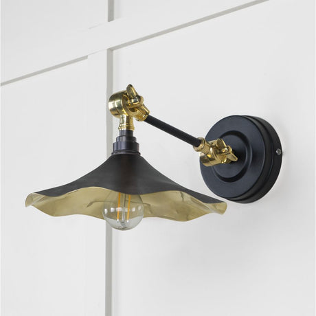 This is an image showing From The Anvil - Smooth Brass Flora Wall Light in Elan Black available from trade door handles, quick delivery and discounted prices