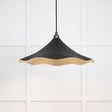 This is an image showing From The Anvil - Smooth Brass Flora Pendant in Elan Black available from trade door handles, quick delivery and discounted prices