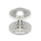 This is an image showing From The Anvil - Polished Marine SS (316) Art Deco Centre Door Knob available from trade door handles, quick delivery and discounted prices