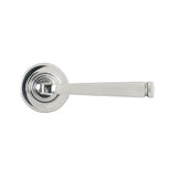 This is an image showing From The Anvil - Polished Marine SS (316) Avon Round Lever on Rose Set (Plain) available from trade door handles, quick delivery and discounted prices