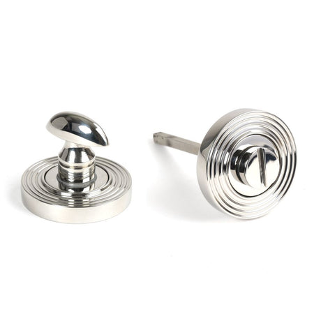 This is an image showing From The Anvil - Polished Marine SS (316) Round Thumbturn Set (Beehive) available from trade door handles, quick delivery and discounted prices