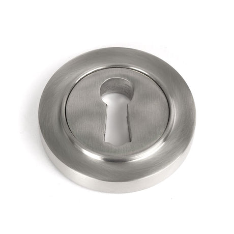 This is an image showing From The Anvil - Satin Marine SS (316) Round Escutcheon (Plain) available from trade door handles, quick delivery and discounted prices