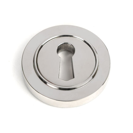 This is an image showing From The Anvil - Polished Marine SS (316) Round Escutcheon (Plain) available from trade door handles, quick delivery and discounted prices