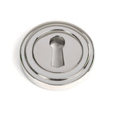 This is an image showing From The Anvil - Polished Marine SS (316) Round Escutcheon (Art Deco) available from trade door handles, quick delivery and discounted prices