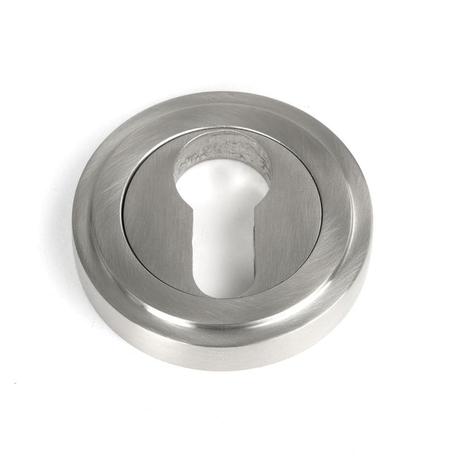 This is an image showing From The Anvil - Satin Marine SS (316) Round Euro Escutcheon (Art Deco) available from trade door handles, quick delivery and discounted prices