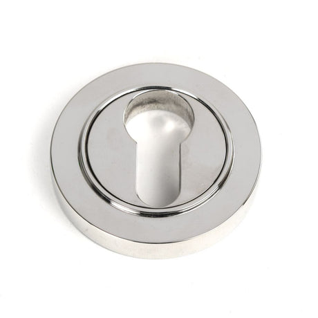 This is an image showing From The Anvil - Polished Marine SS (316) Round Euro Escutcheon (Plain) available from trade door handles, quick delivery and discounted prices