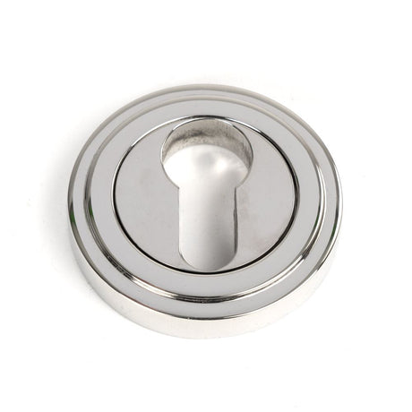 This is an image showing From The Anvil - Polished Marine SS (316) Round Euro Escutcheon (Art Deco) available from trade door handles, quick delivery and discounted prices