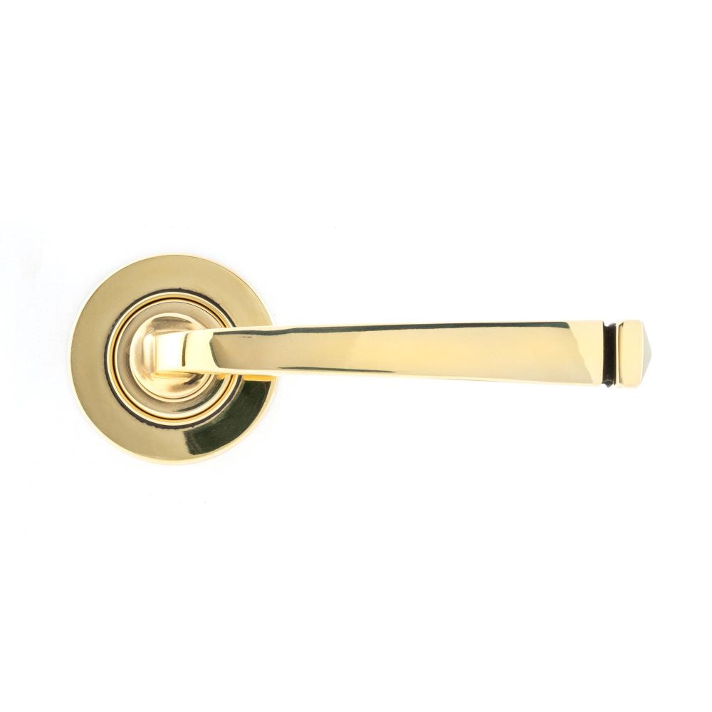 This is an image showing From The Anvil - Aged Brass Avon Round Lever on Rose Set (Plain) - Unsprung available from trade door handles, quick delivery and discounted prices