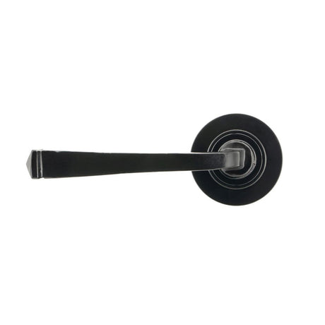 This is an image showing From The Anvil - Black Avon Round Lever on Rose Set (Plain) - Unsprung available from trade door handles, quick delivery and discounted prices