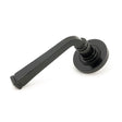 This is an image showing From The Anvil - Black Avon Round Lever on Rose Set (Plain) - Unsprung available from trade door handles, quick delivery and discounted prices