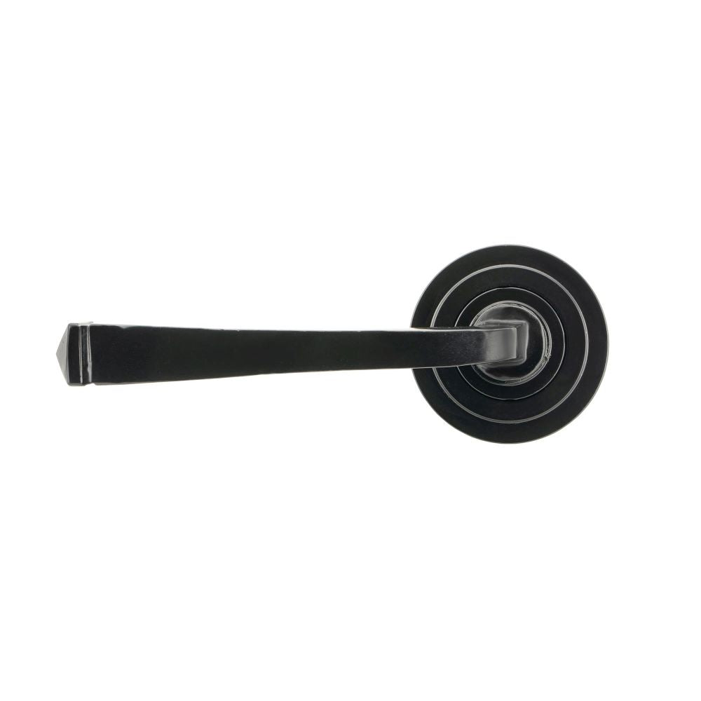 This is an image showing From The Anvil - Black Avon Round Lever on Rose Set (Art Deco) - Unsprung available from trade door handles, quick delivery and discounted prices