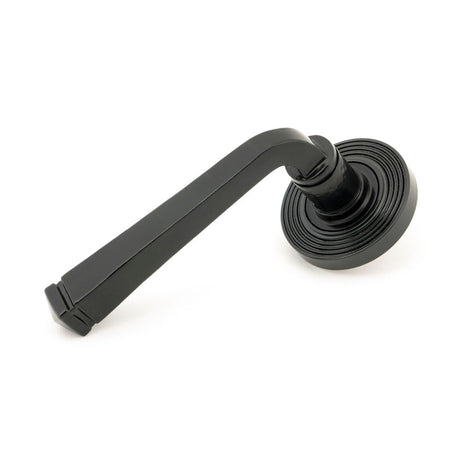 This is an image showing From The Anvil - Black Avon Round Lever on Rose Set (Beehive) - Unsprung available from trade door handles, quick delivery and discounted prices