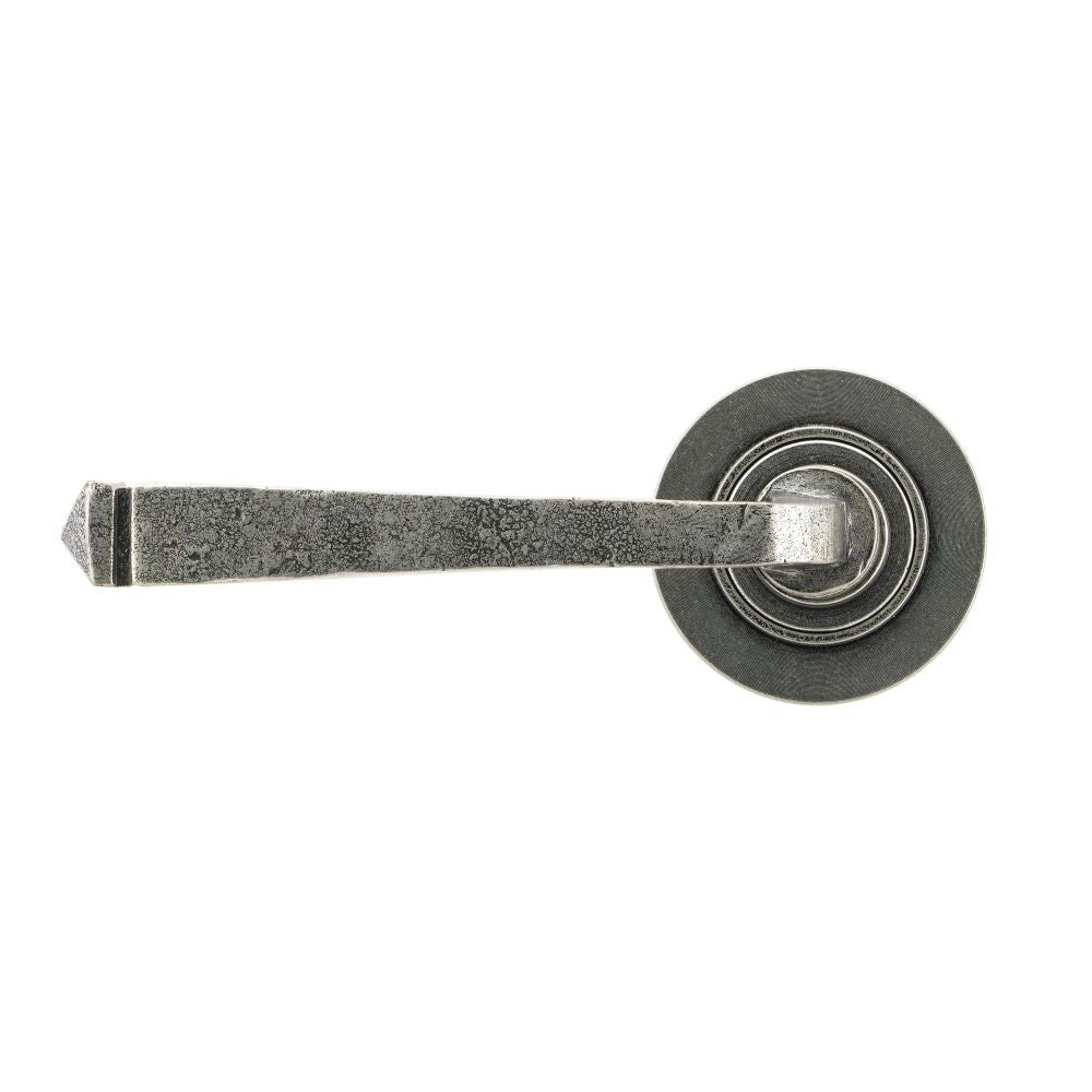 This is an image showing From The Anvil - Pewter Avon Round Lever on Rose Set (Plain) - Unsprung available from trade door handles, quick delivery and discounted prices