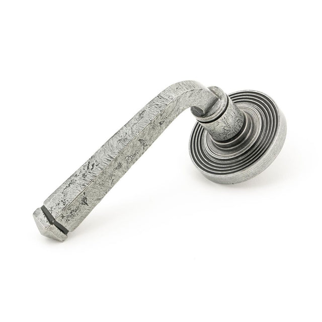 This is an image showing From The Anvil - Pewter Avon Round Lever on Rose Set (Beehive) - Unsprung available from trade door handles, quick delivery and discounted prices