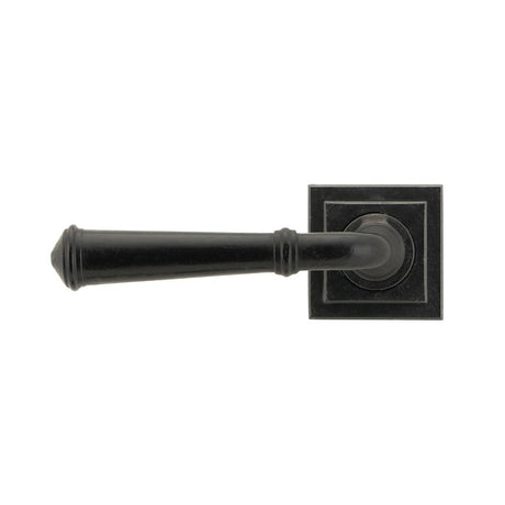 This is an image showing From The Anvil - External Beeswax Regency Lever on Rose Set (Square) - Unsprung available from trade door handles, quick delivery and discounted prices